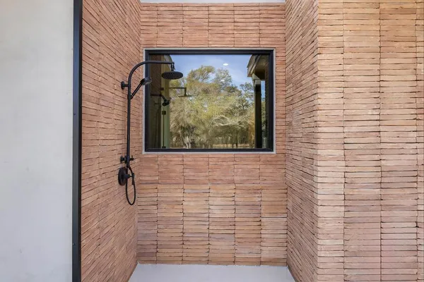 a view of swimming pool with trees