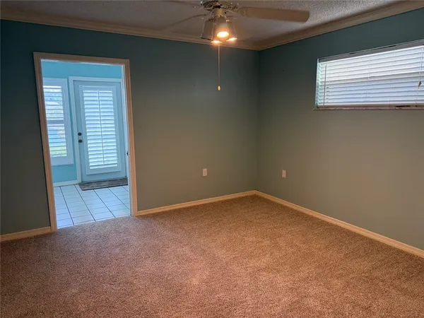an empty room with a empty space and a window