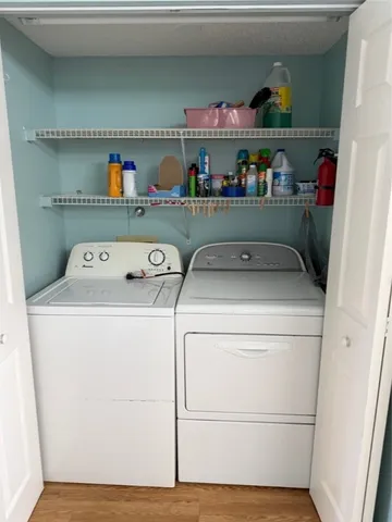 a utility room with dryer and washer