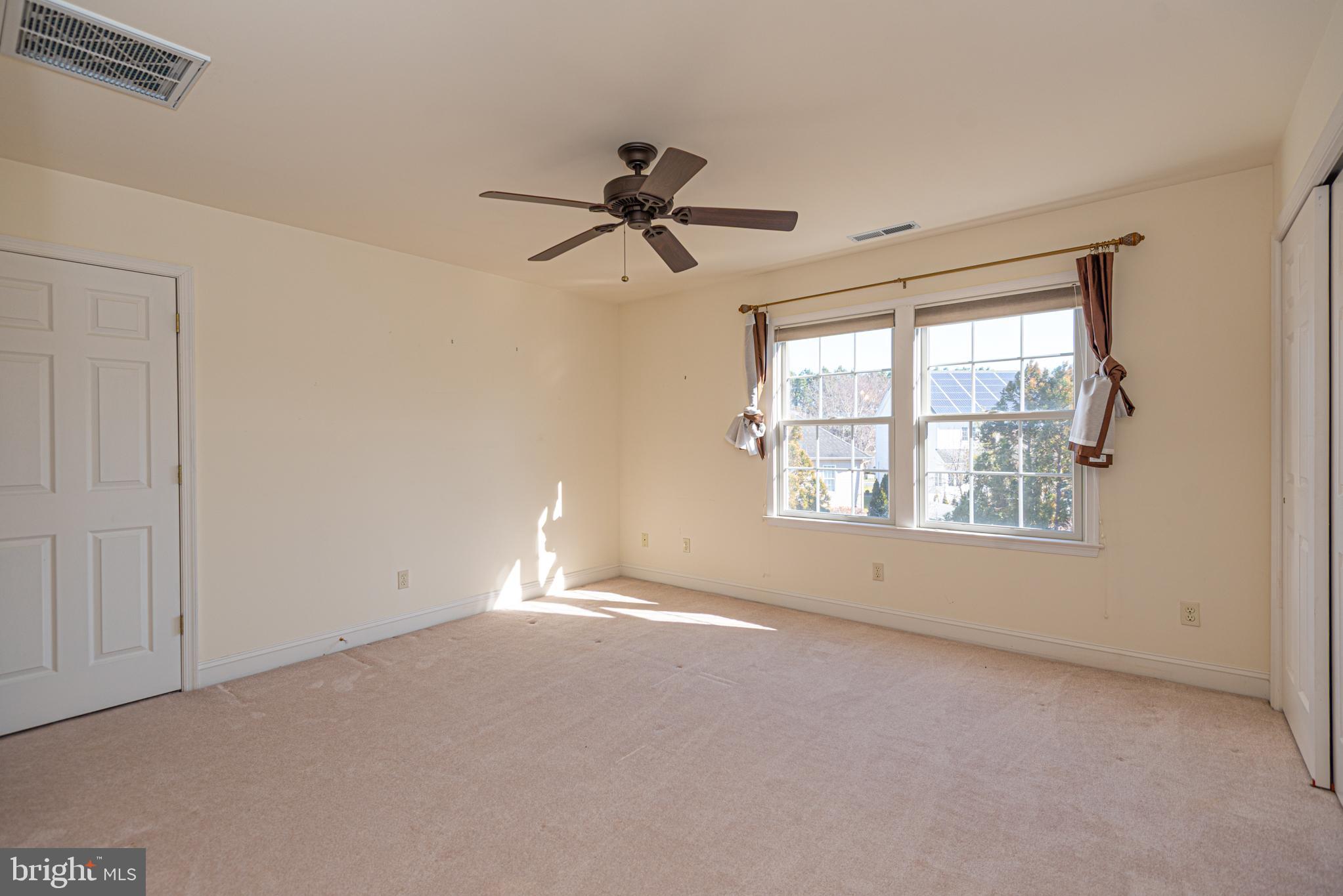 6023 Tarry Town Road Salisbury, MD 21801 - Photo 27 of 61 Bright and airy room with large windows.