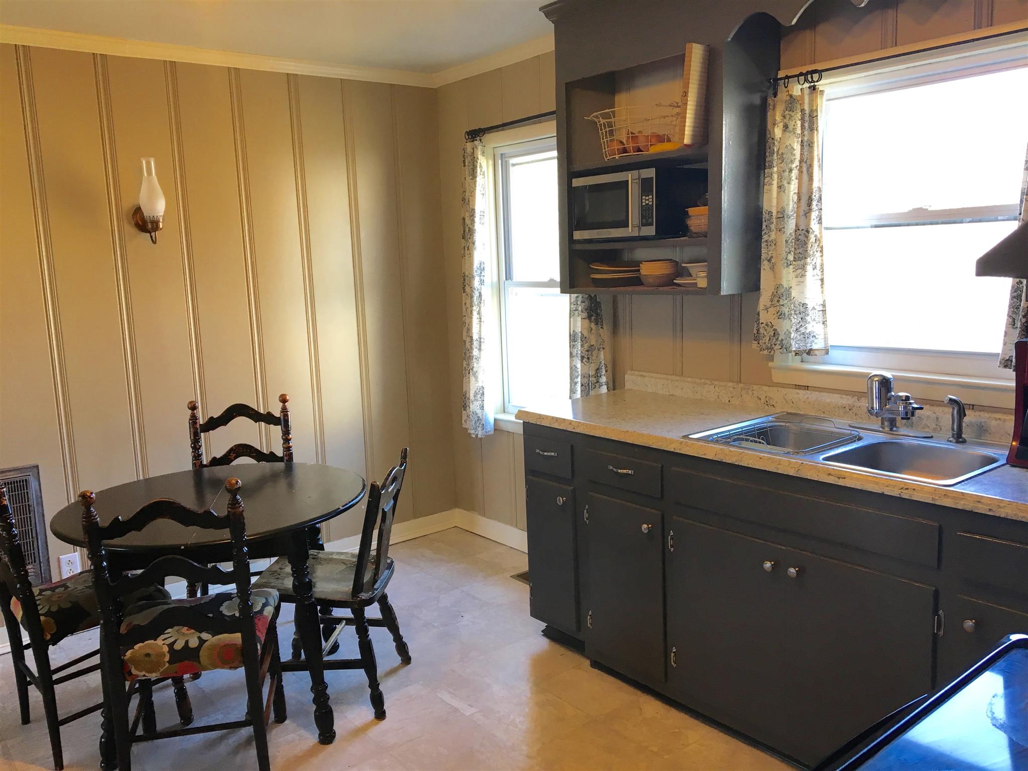 1948 Roberts Bend Road Columbia, TN 38401 - Photo 6 of 10 a kitchen with a table chairs sink and cabinets