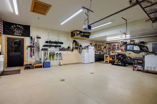 a view of a garage with a bike and storage
