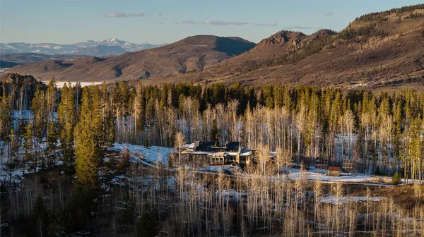 a view of multiple house with a yard
