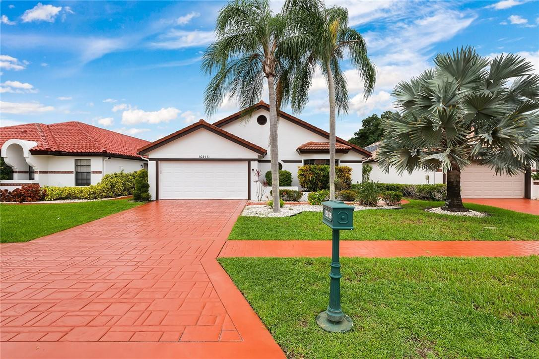 10216 Sunset Bend Drive Boca Raton, FL 33428 - Photo 1 of 24 Front View