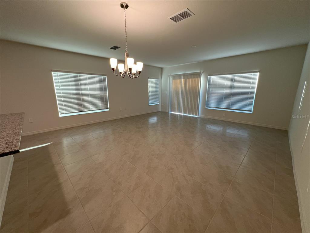 758 Stoney Point Circle Davenport, FL 33896 - Photo 11 of 42 a view of livingroom and window