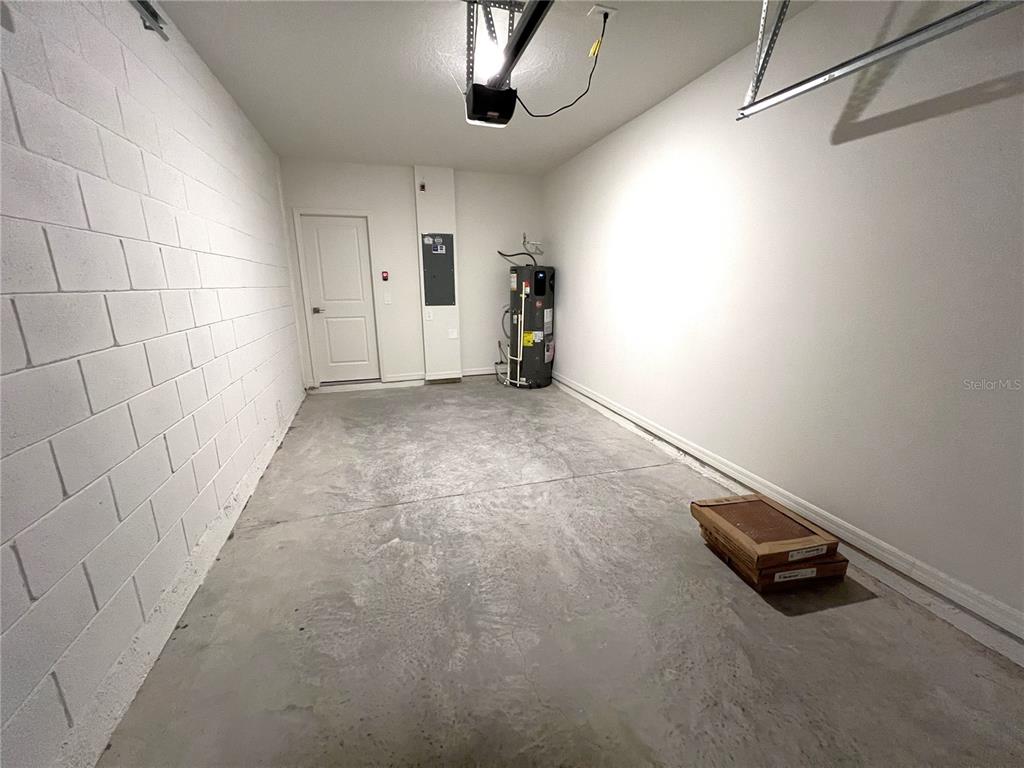 758 Stoney Point Circle Davenport, FL 33896 - Photo 21 of 42 an empty room with a empty space and windows