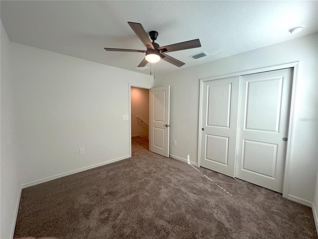 758 Stoney Point Circle Davenport, FL 33896 - Photo 28 of 42 a view of an empty room