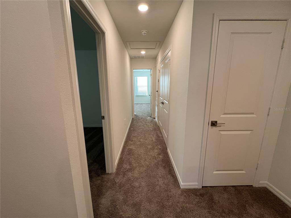 758 Stoney Point Circle Davenport, FL 33896 - Photo 33 of 42 a view of a hallway