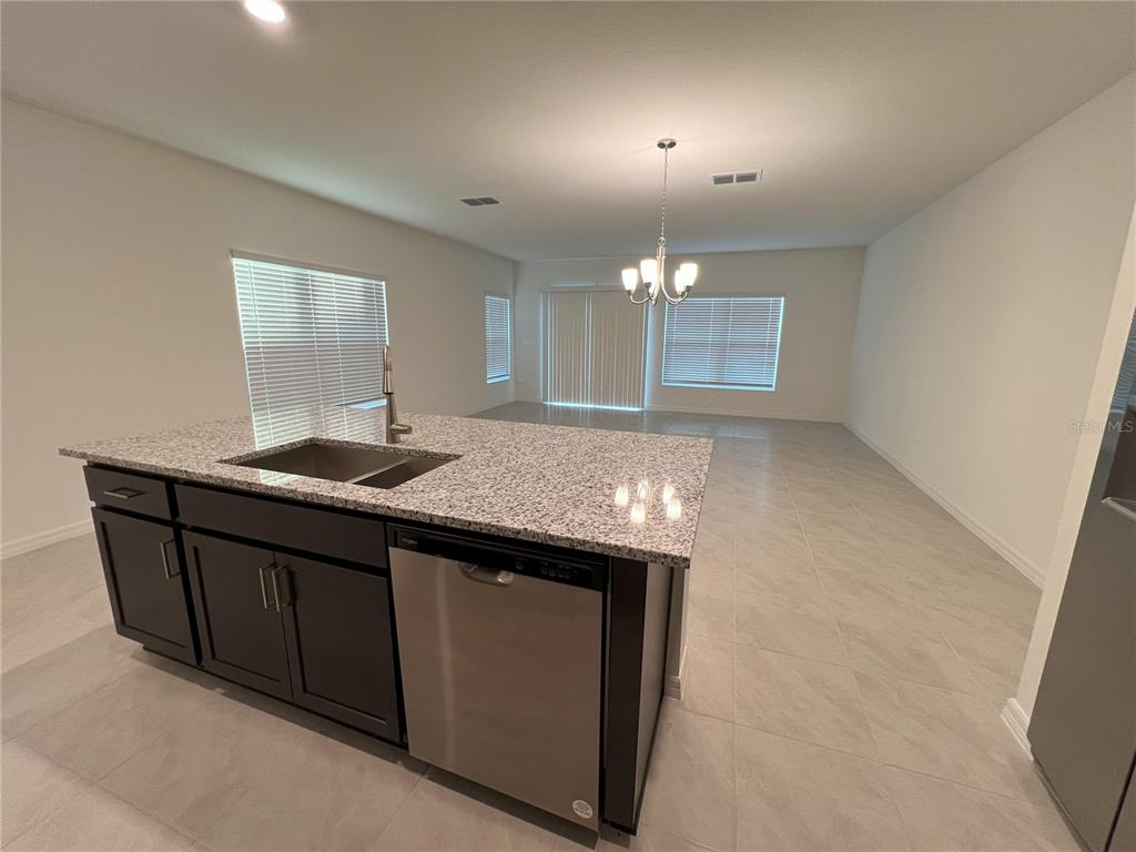 758 Stoney Point Circle Davenport, FL 33896 - Photo 8 of 42 a bathroom with a sink and a mirror