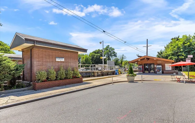 a view of a car parked in front of a house