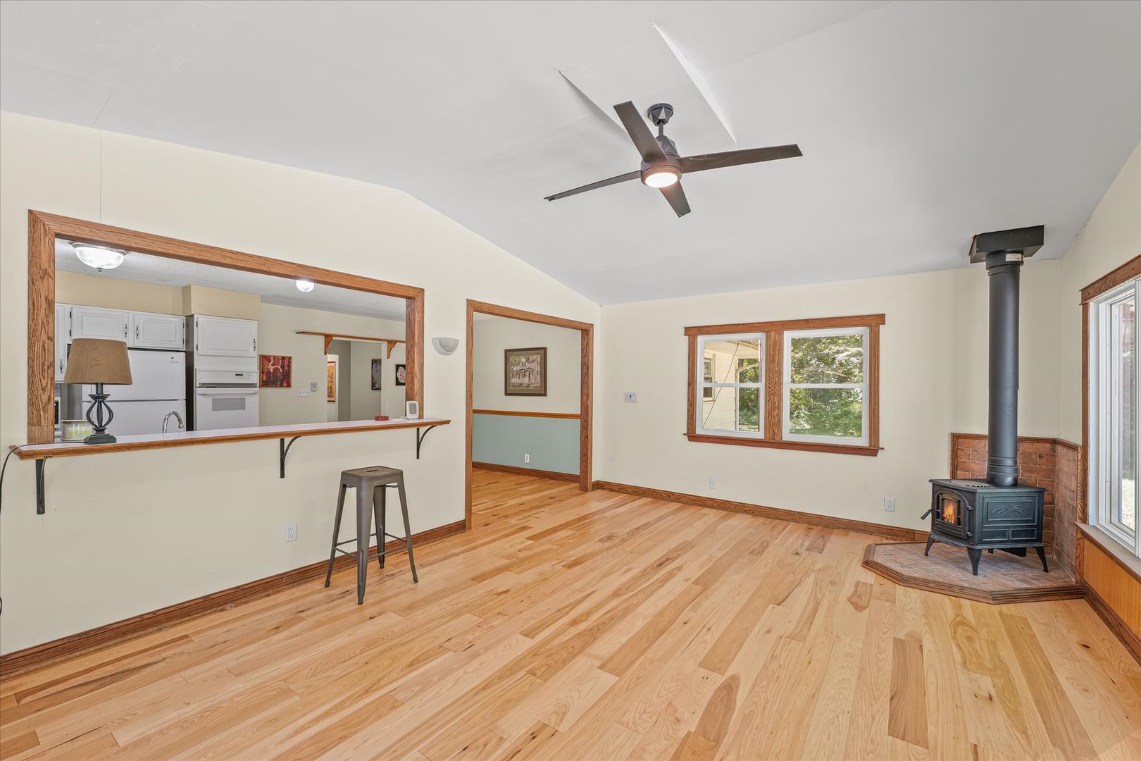 9835 East 1610 North Road Oakwood, IL 61858 - Photo 15 of 35 a bedroom with a bed and wooden floor