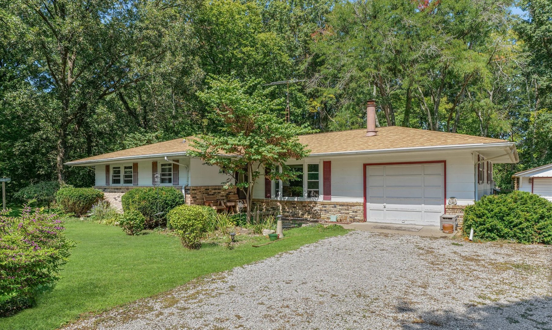 9835 East 1610 North Road Oakwood, IL 61858 - Photo 2 of 35 a front view of house with yard and green space