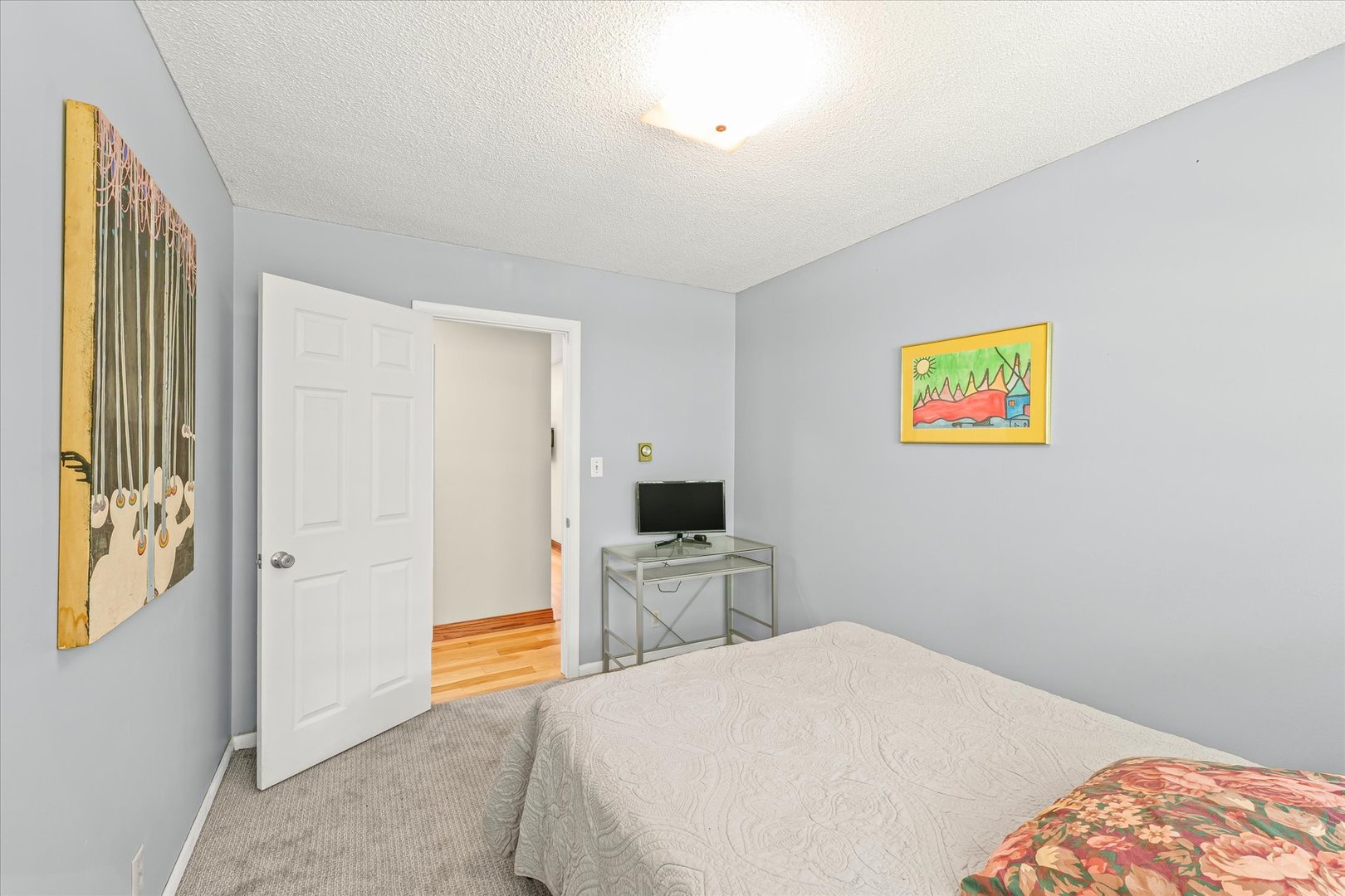 9835 East 1610 North Road Oakwood, IL 61858 - Photo 22 of 35 a bedroom with a bed and wooden floor