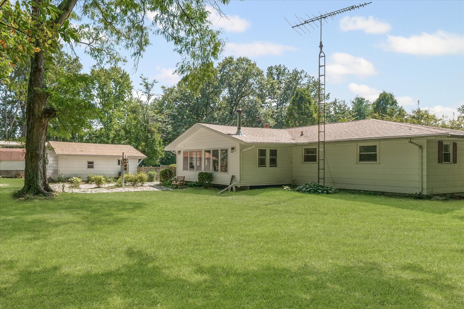 9835 East 1610 North Road Oakwood, IL 61858 - Photo 26 of 35 a front view of house with yard and seating area