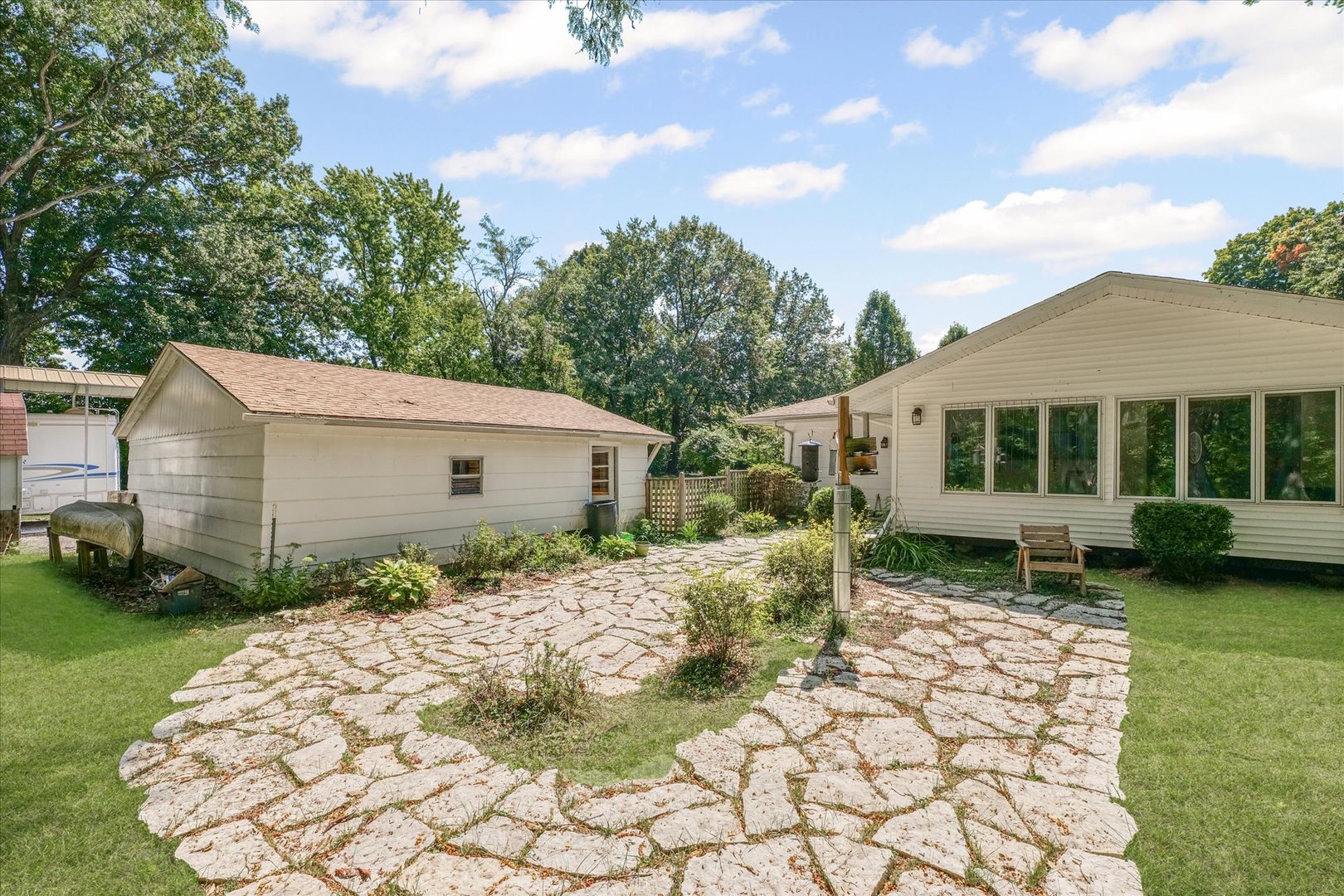 9835 East 1610 North Road Oakwood, IL 61858 - Photo 30 of 35 a front view of a house with garden