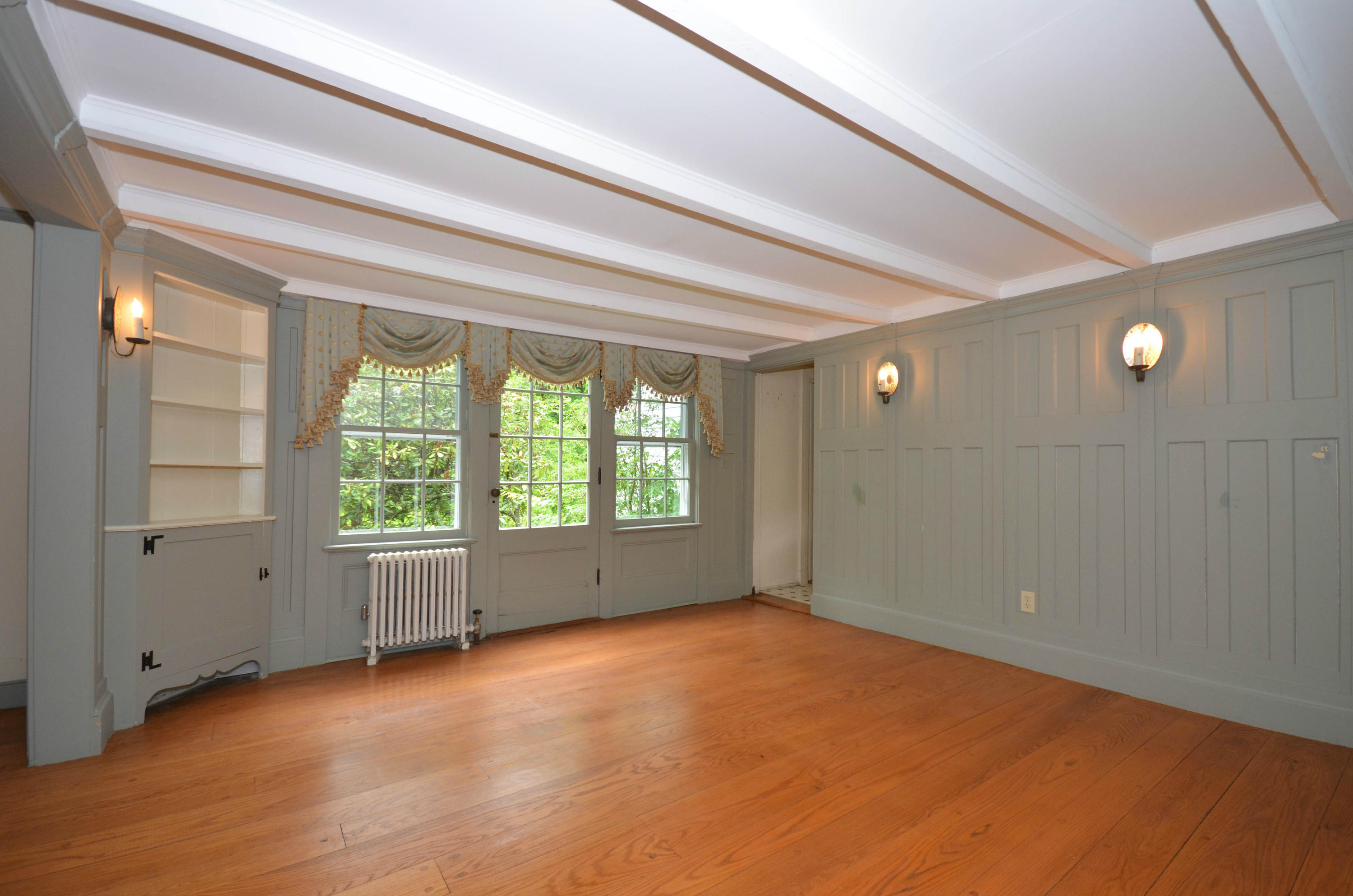 1462 Oenoke Ridge New Canaan, CT 06840 - Photo 7 of 25 a view of an empty room with a window