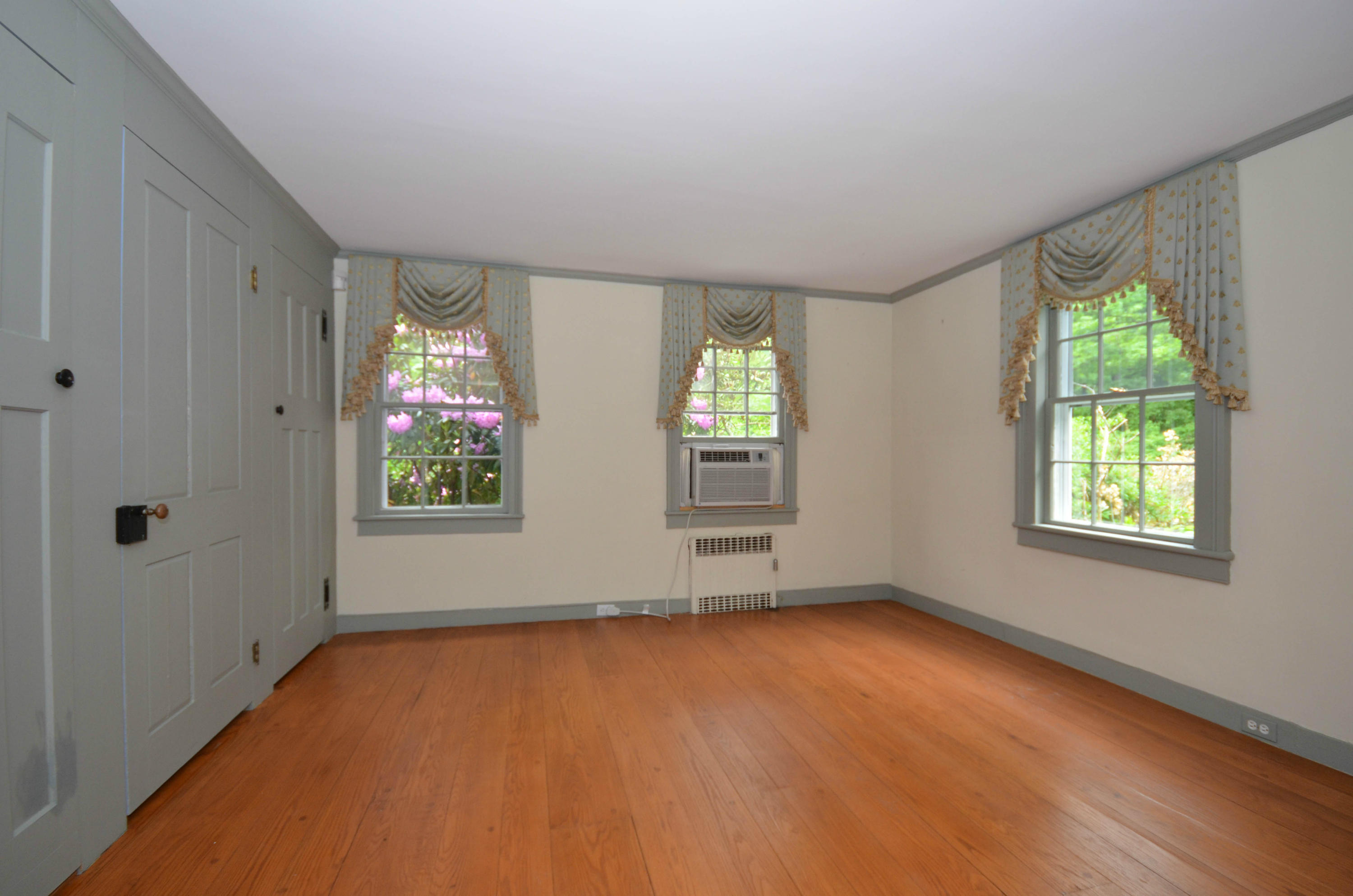 1462 Oenoke Ridge New Canaan, CT 06840 - Photo 9 of 25 an empty room with windows