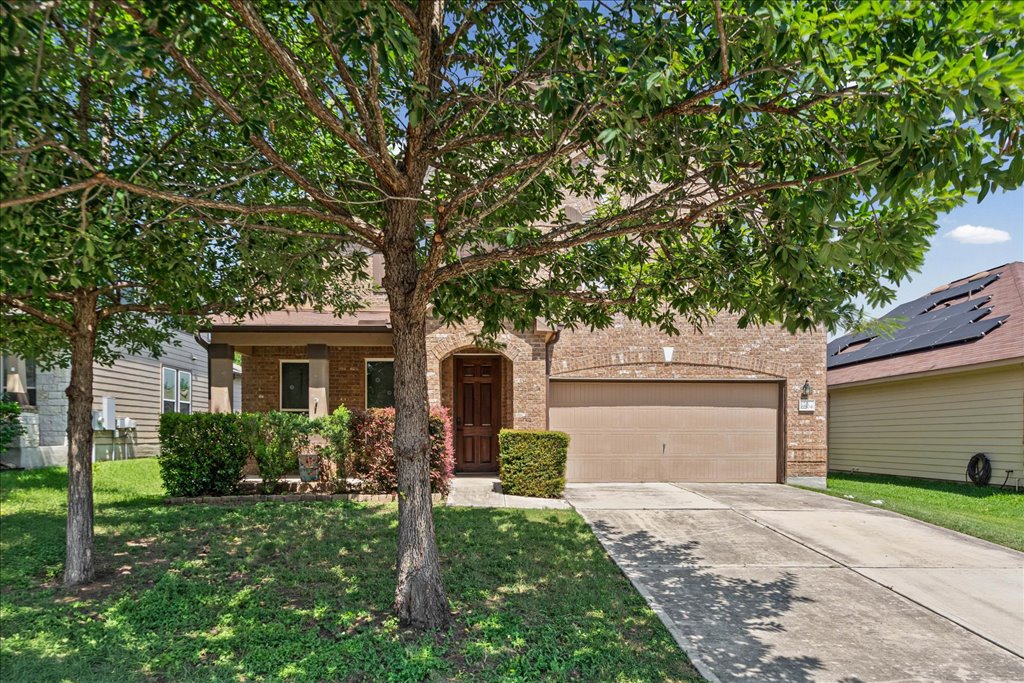 8804 Capitol View Drive Austin, TX 78747 - Photo 2 of 32 a front view of house with yard and green space