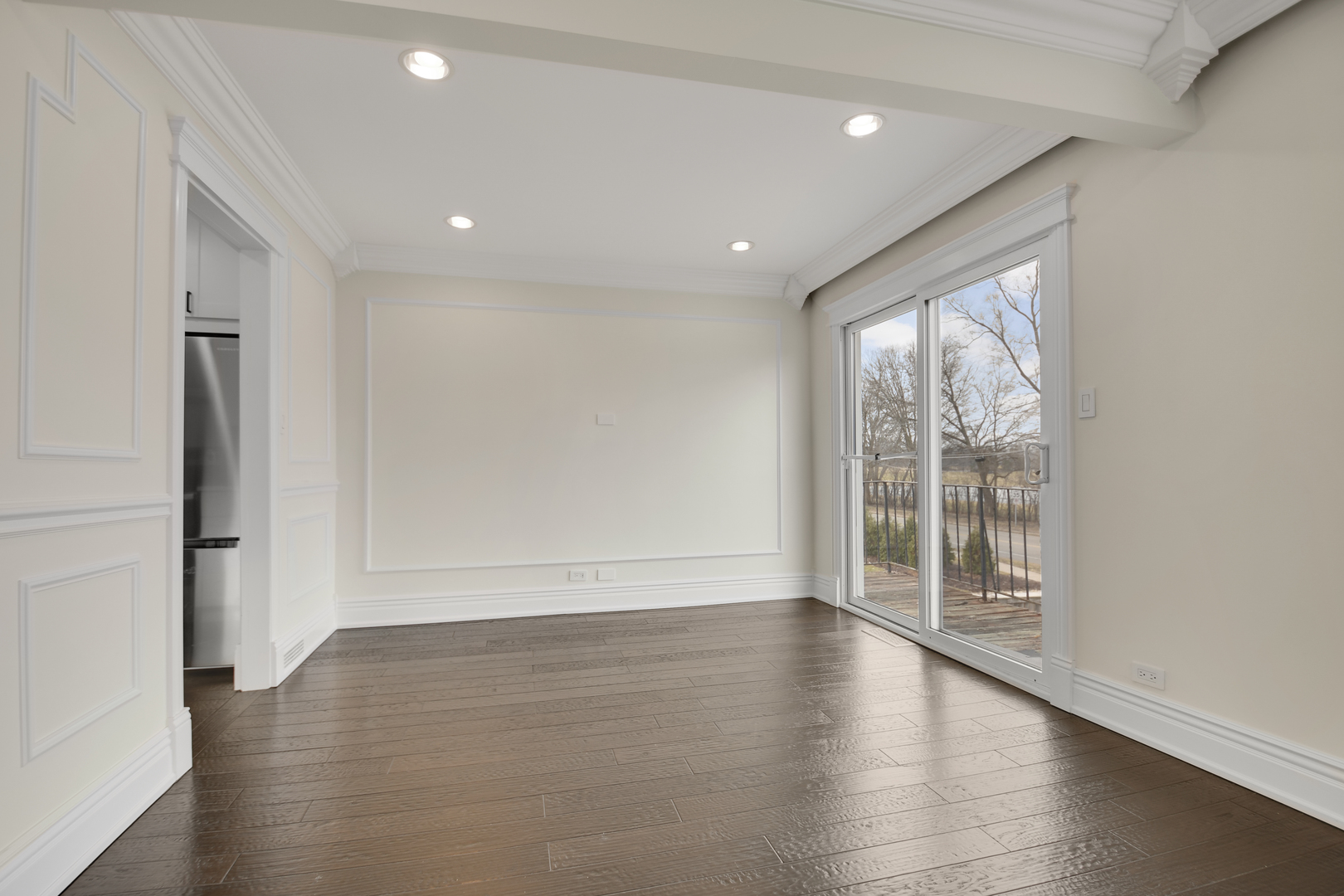 491 Old Surrey Road, Unit B Hinsdale, IL 60521 - Photo 10 of 29 wooden floor in an empty room with a window