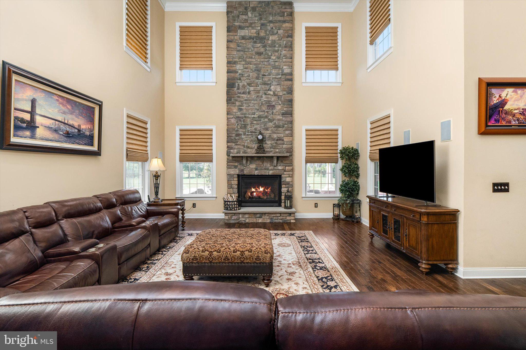 25 Weathervane Circle Cream Ridge, NJ 08514 - Photo 19 of 91 a living room with furniture and a flat screen tv