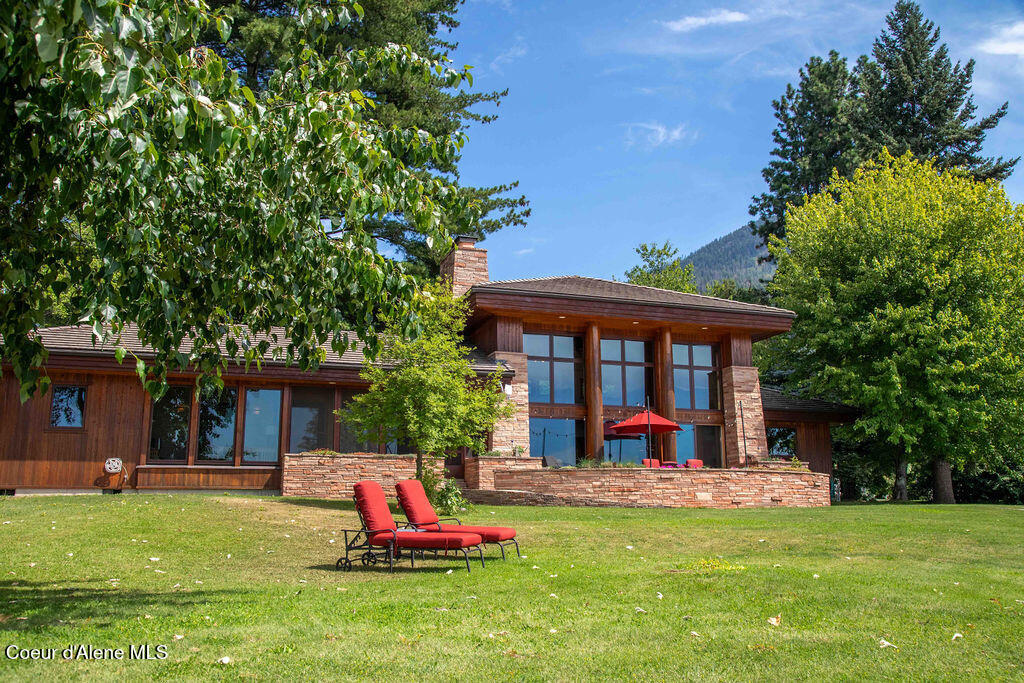 440 Pringle Hope, ID 83836 - Photo 2 of 46 The back is a wall of windows and Patio