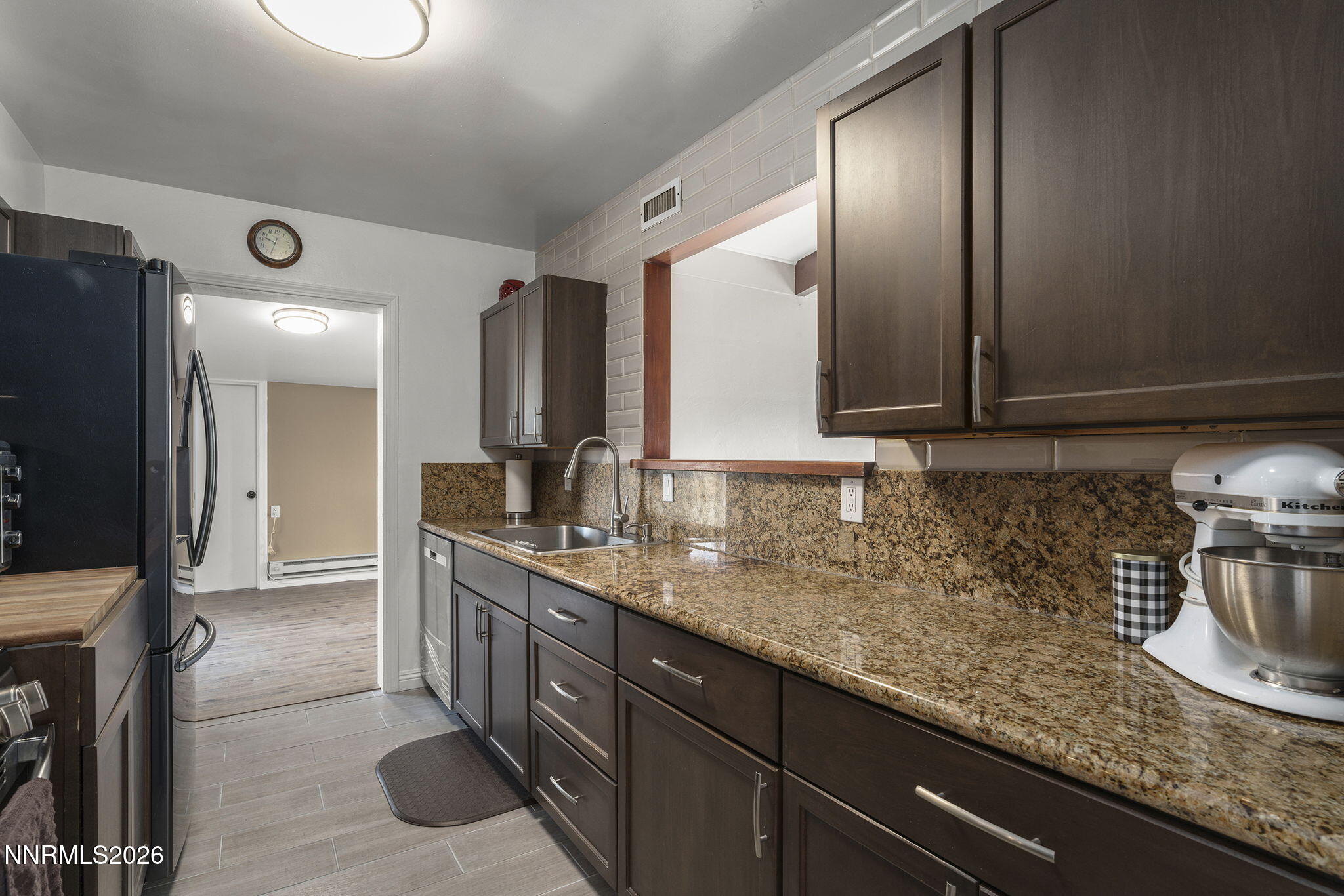 11303 Rocky Mountain Street Reno, NV 89506 - Photo 12 of 28 a bathroom with a sink and a mirror