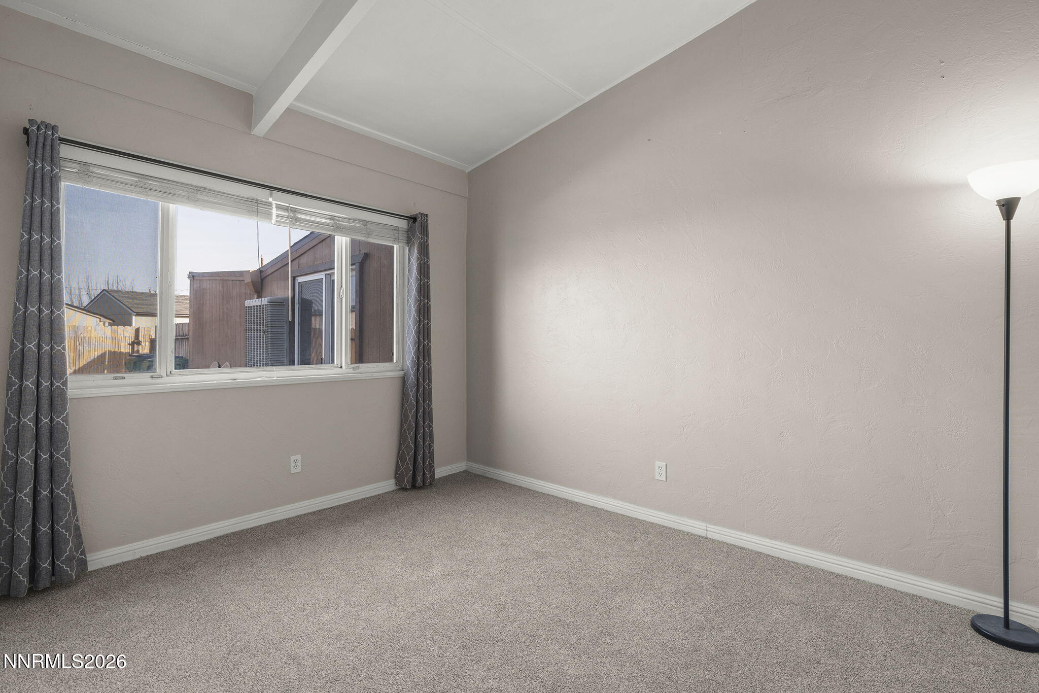 11303 Rocky Mountain Street Reno, NV 89506 - Photo 18 of 28 a view of a room that has a large window