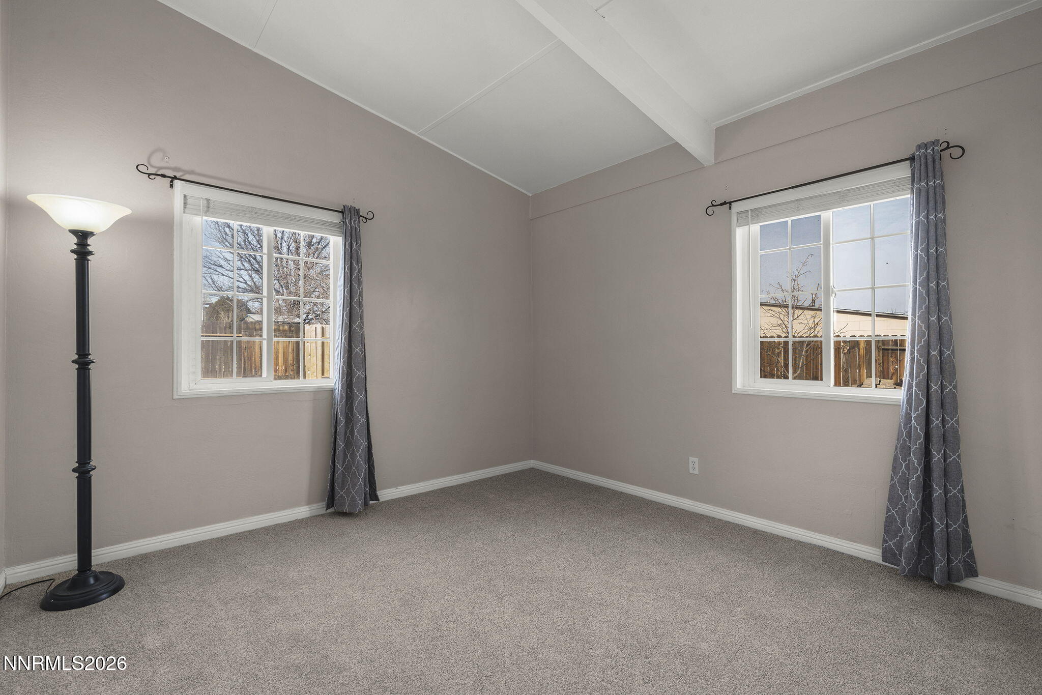 11303 Rocky Mountain Street Reno, NV 89506 - Photo 19 of 28 an empty room with windows