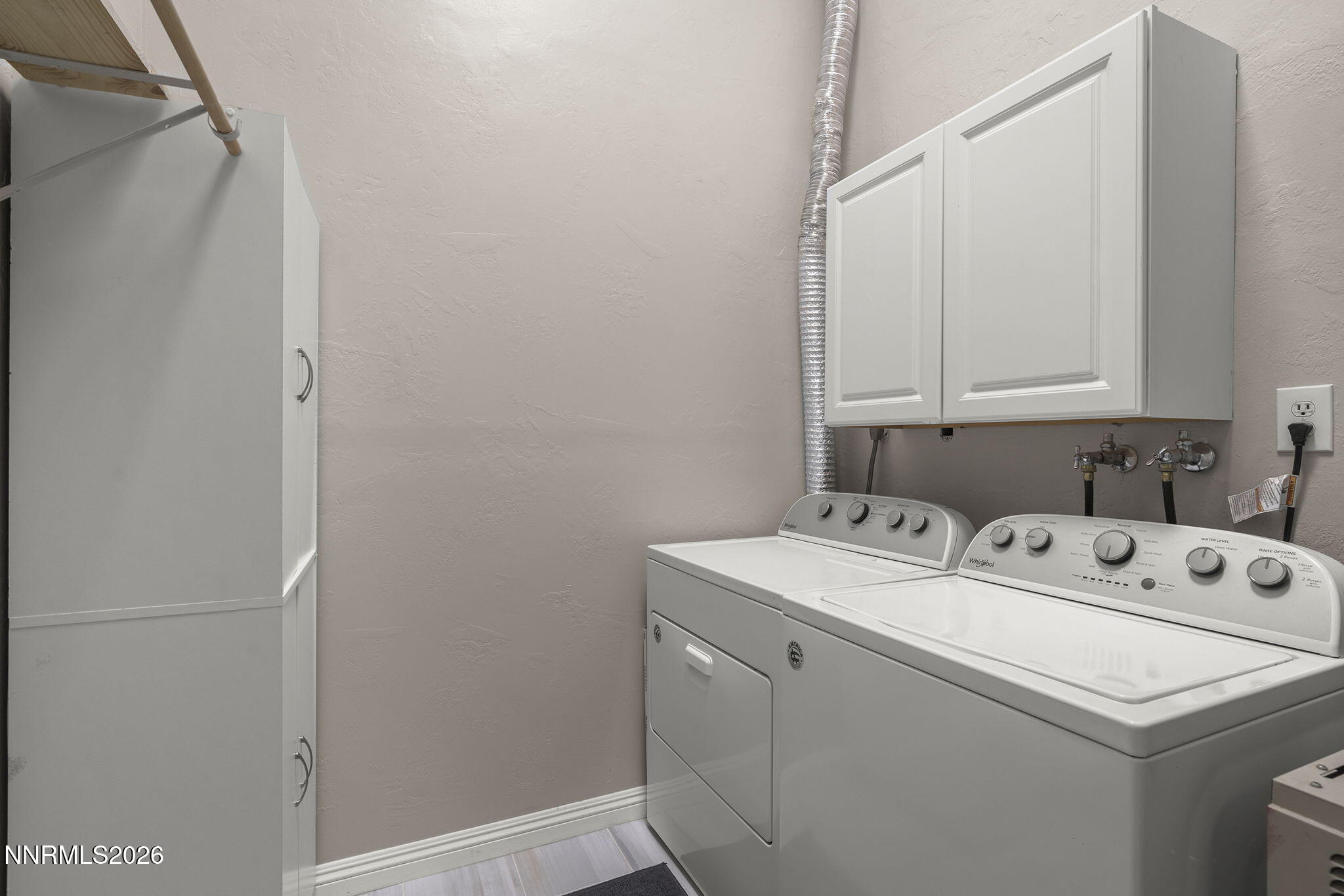 11303 Rocky Mountain Street Reno, NV 89506 - Photo 22 of 28 a utility room with dryer and washer