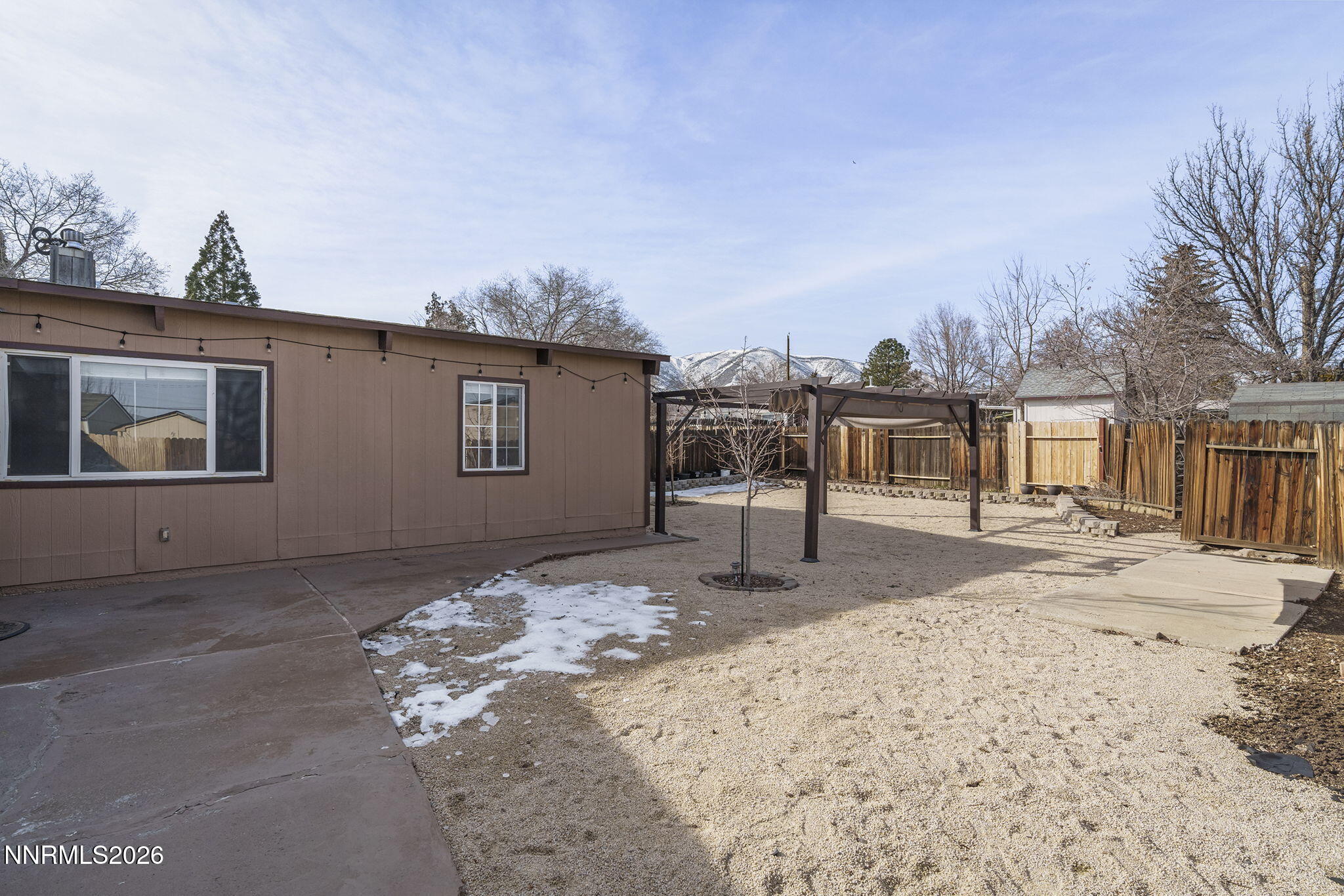 11303 Rocky Mountain Street Reno, NV 89506 - Photo 24 of 28 a front view of a house with a yard