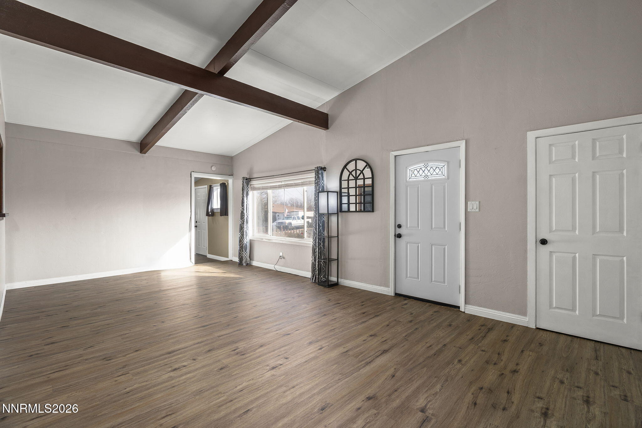 11303 Rocky Mountain Street Reno, NV 89506 - Photo 8 of 28 a view of empty room with wooden floor