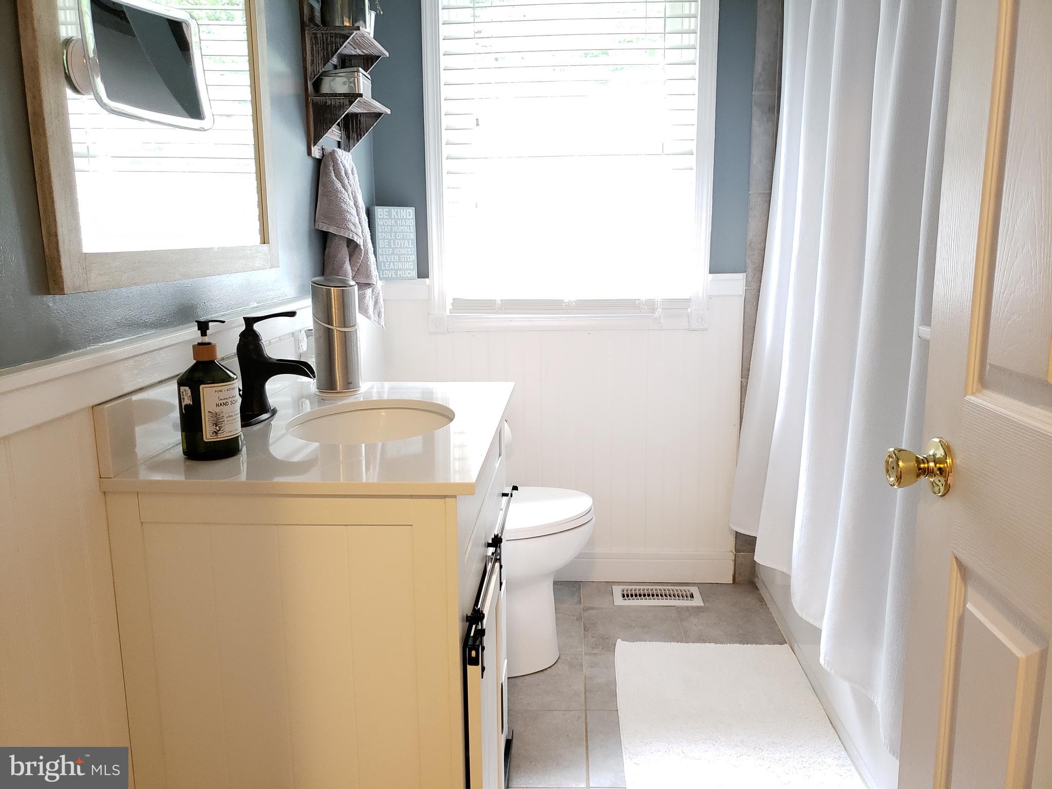 1138 Calvert Beach Road St. Leonard, MD 20685 - Photo 13 of 17 Main Bath with beautiful tile work