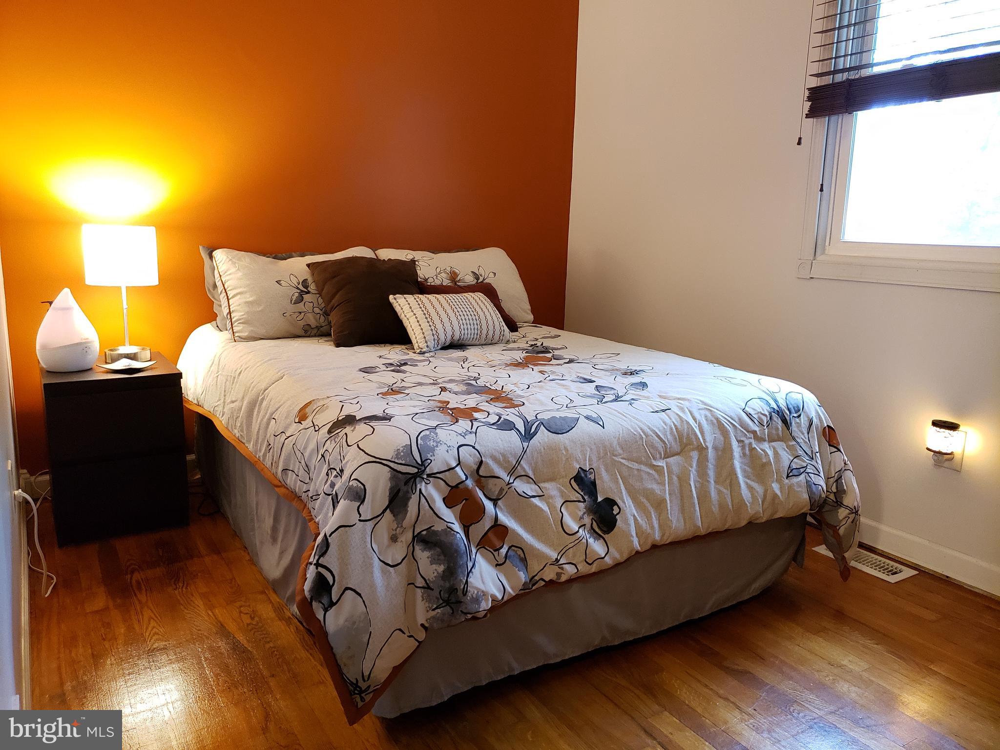 1138 Calvert Beach Road St. Leonard, MD 20685 - Photo 16 of 17 3rd bedroom on main level with hardwood floors
