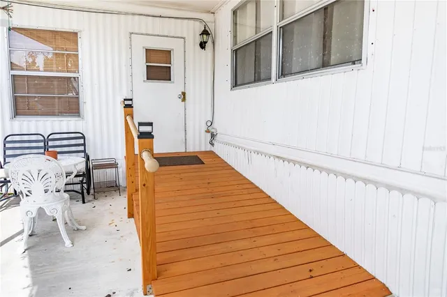 swimming pool view with a lake view