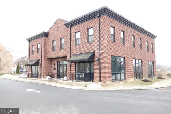a front view of a building with street