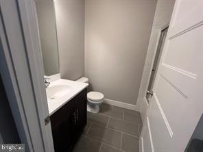 228 South Mill Road, Unit 232 Kennett Square, PA 19348 - Photo 8 of 12 a bathroom with a sink a toilet and shower