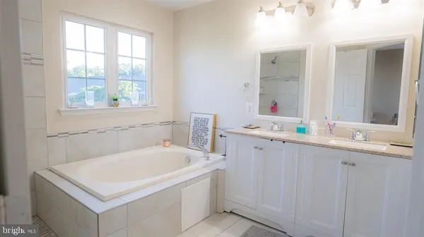 a bathroom with a sink and a bathtub