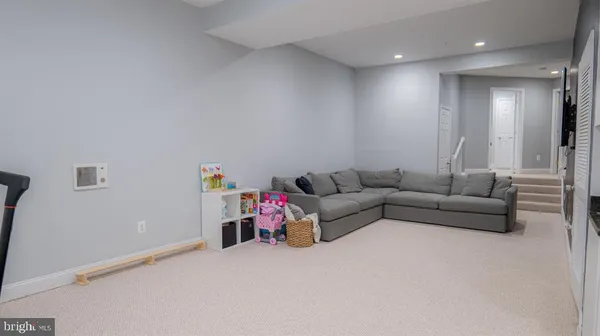 a living room with furniture and a couch