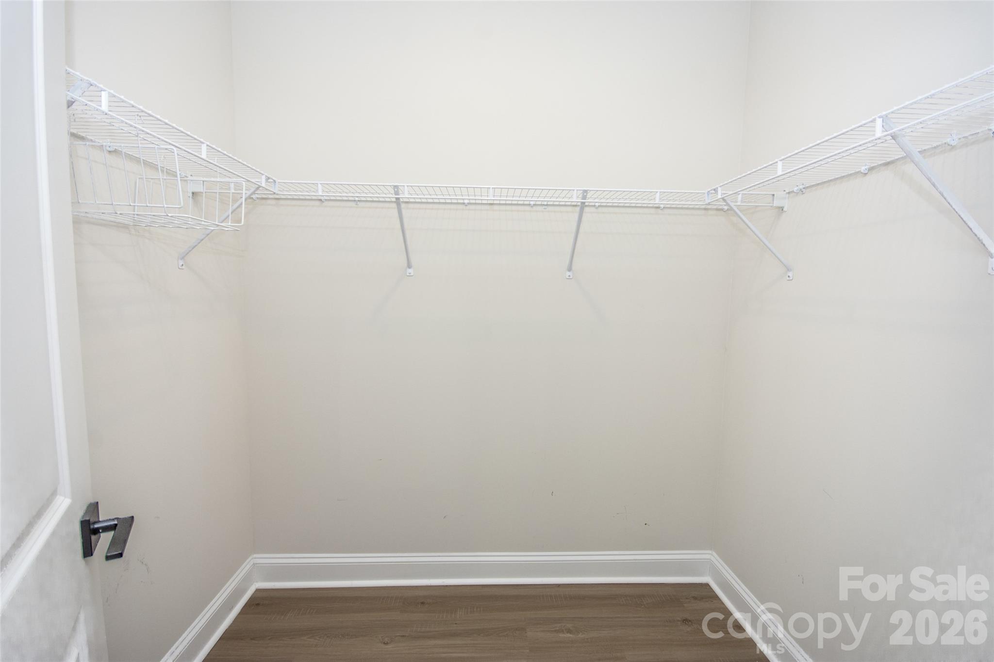 109 Brixham Loop Troutman, NC 28166 - Photo 27 of 44 a view of a room with racks on the wall
