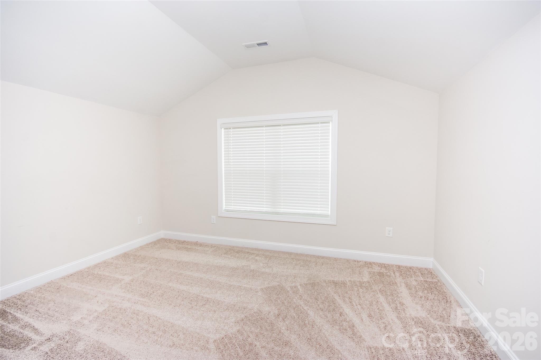 109 Brixham Loop Troutman, NC 28166 - Photo 35 of 44 a view of a room that has a window in it