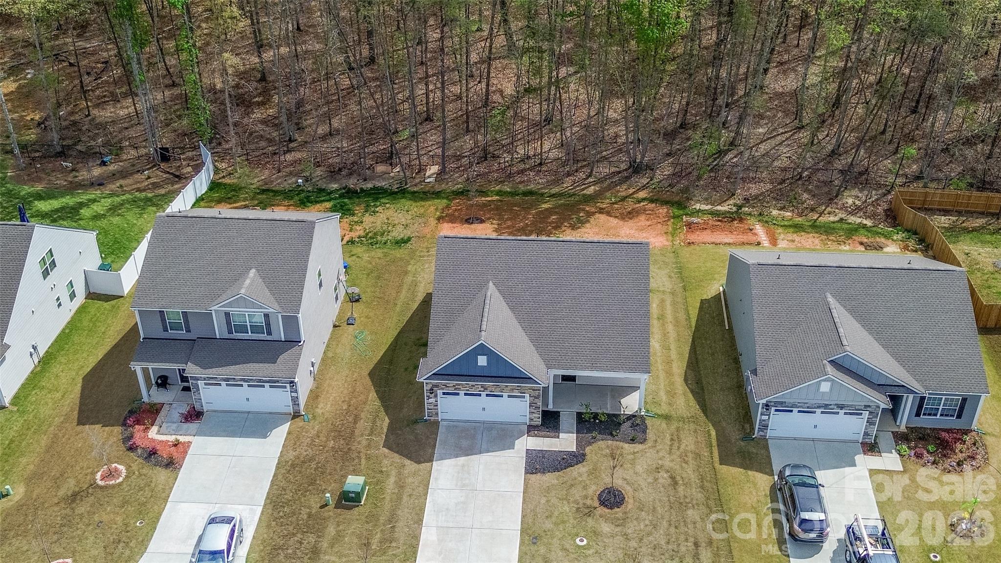 109 Brixham Loop Troutman, NC 28166 - Photo 6 of 44 an aerial view of residential house with outdoor space and parking