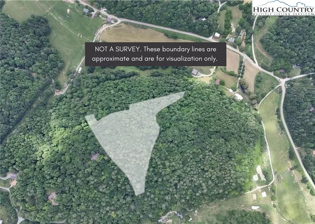 a sign that is sitting on a brick wall