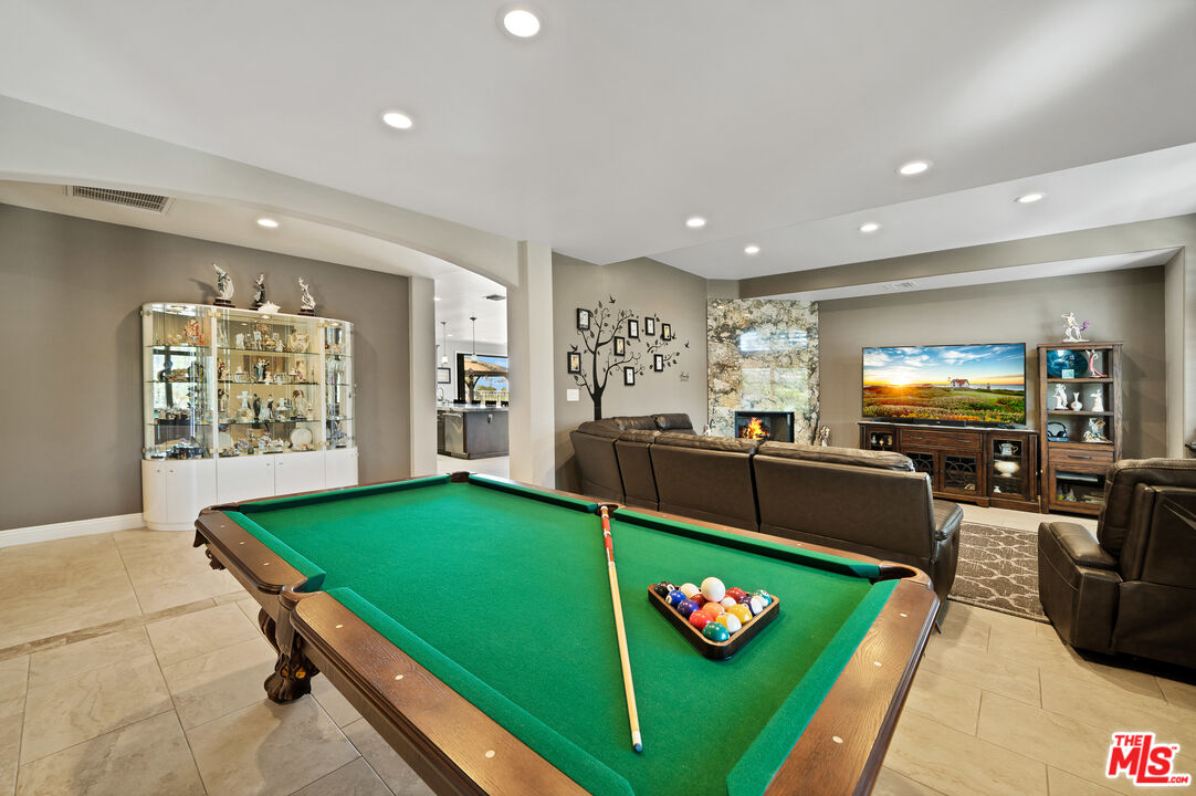 5437 Middlecrest Road Rancho Palos Verdes, CA 90275 - Photo 10 of 32 a living room with furniture and a pool table
