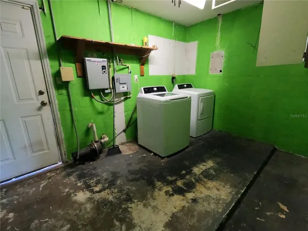 a view of a room with washing machine