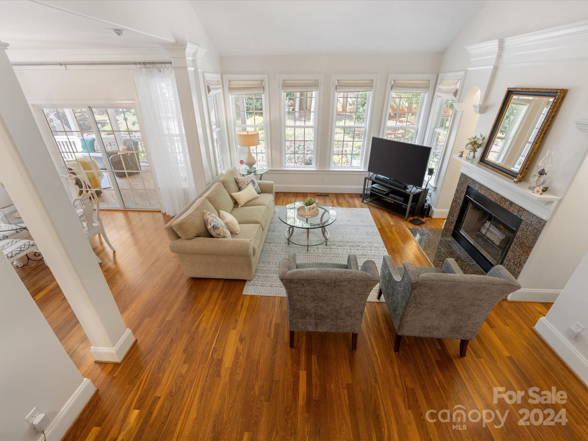4100 Cherrybrook Drive Mint Hill, NC 28227 - Photo 12 of 45 a living room with furniture and a flat screen tv