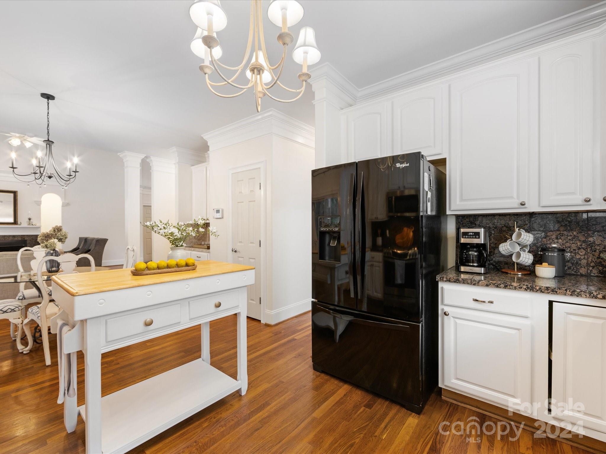 4100 Cherrybrook Drive Mint Hill, NC 28227 - Photo 15 of 45 a kitchen with a refrigerator a stove a microwave and cabinets