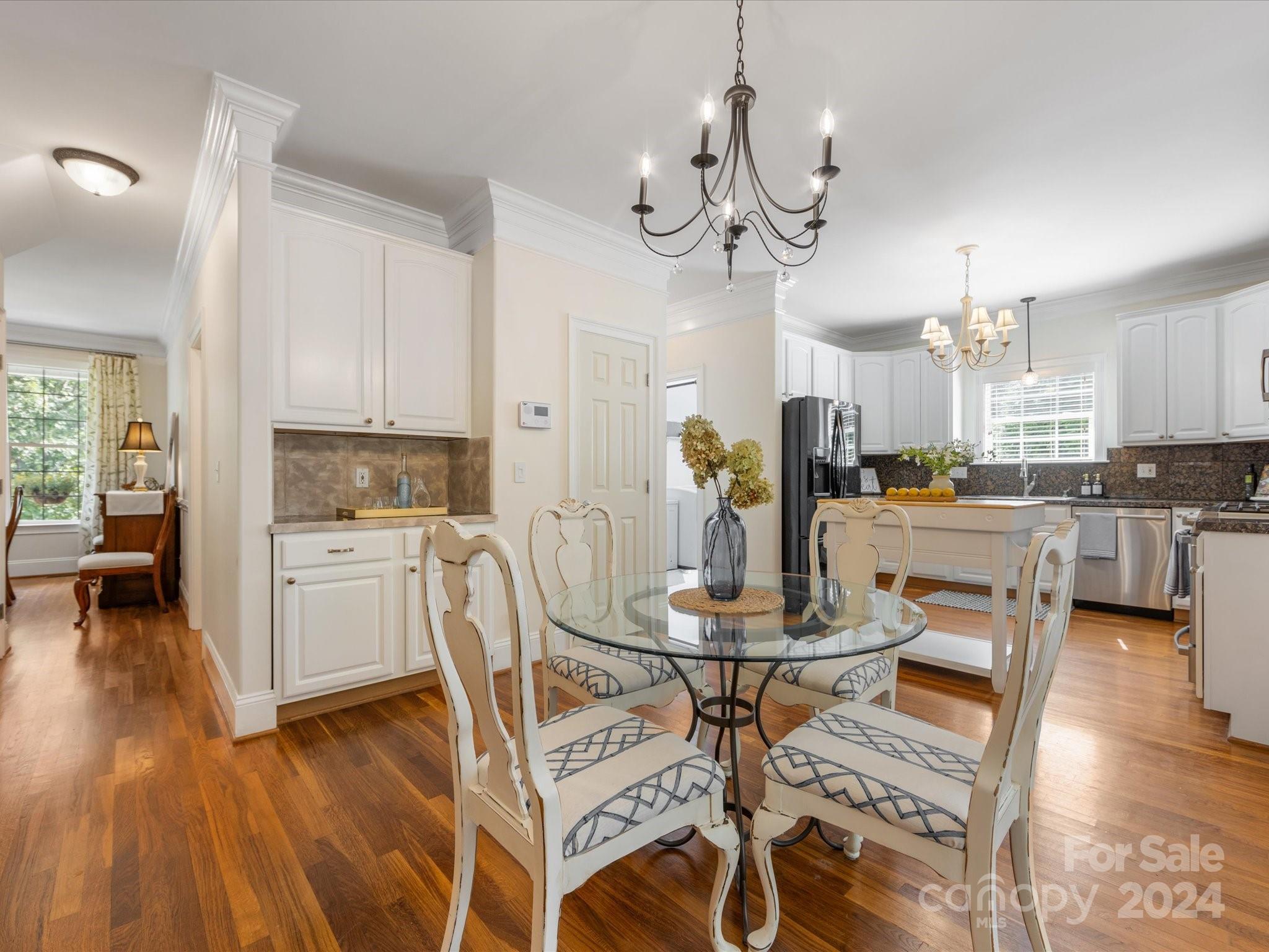 4100 Cherrybrook Drive Mint Hill, NC 28227 - Photo 16 of 45 a view of a dining room with furniture and wooden floor