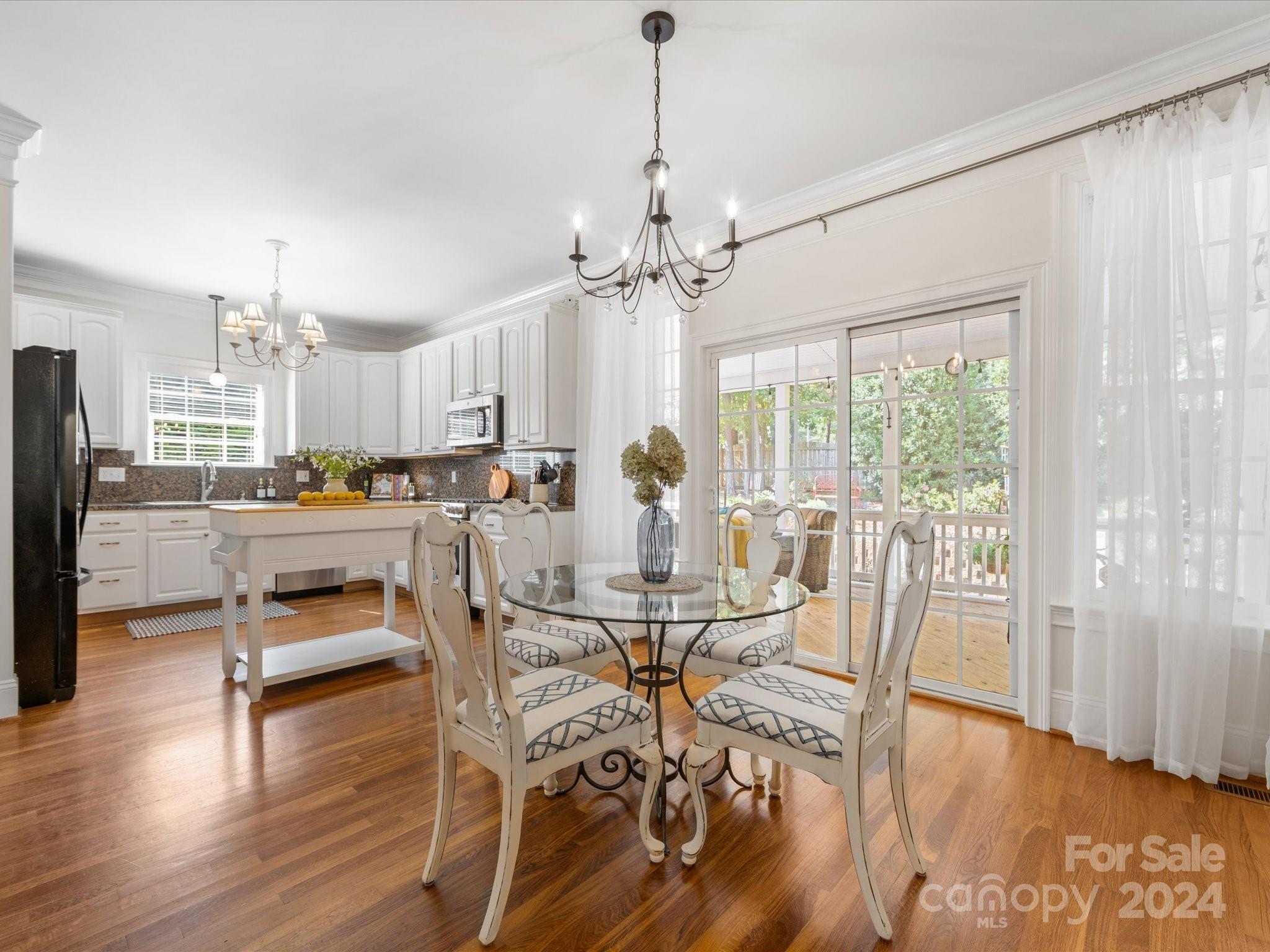 4100 Cherrybrook Drive Mint Hill, NC 28227 - Photo 17 of 45 a view of a dining room with furniture window and wooden floor