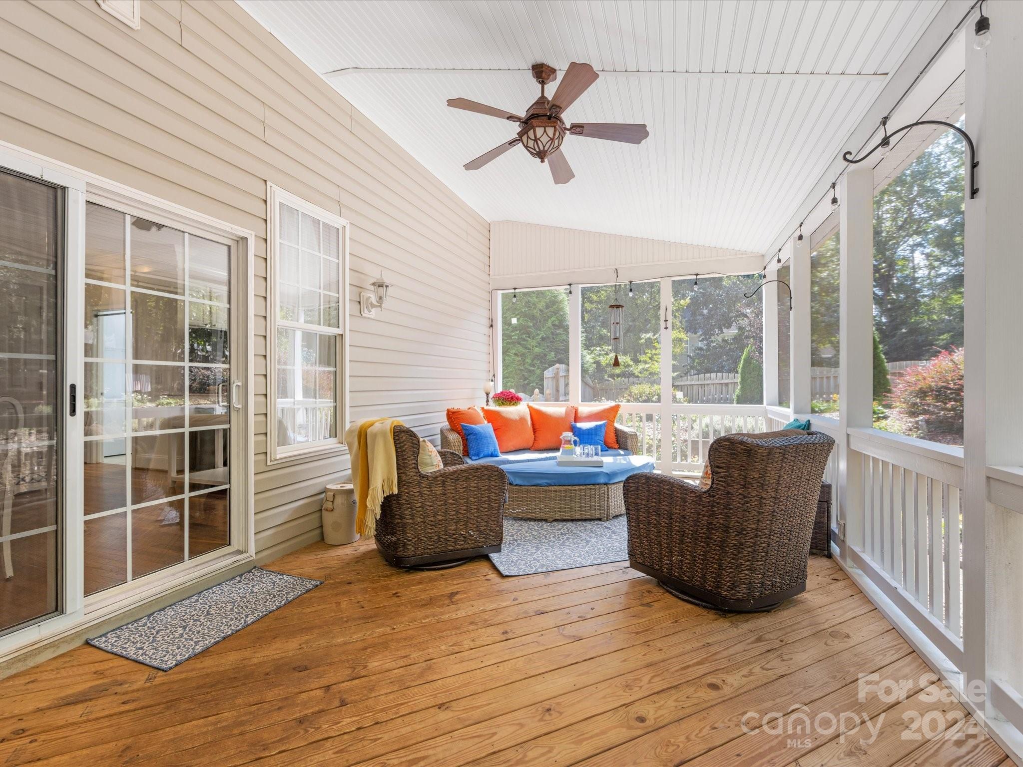 4100 Cherrybrook Drive Mint Hill, NC 28227 - Photo 18 of 45 a living room with furniture floor to ceiling window and wooden floor