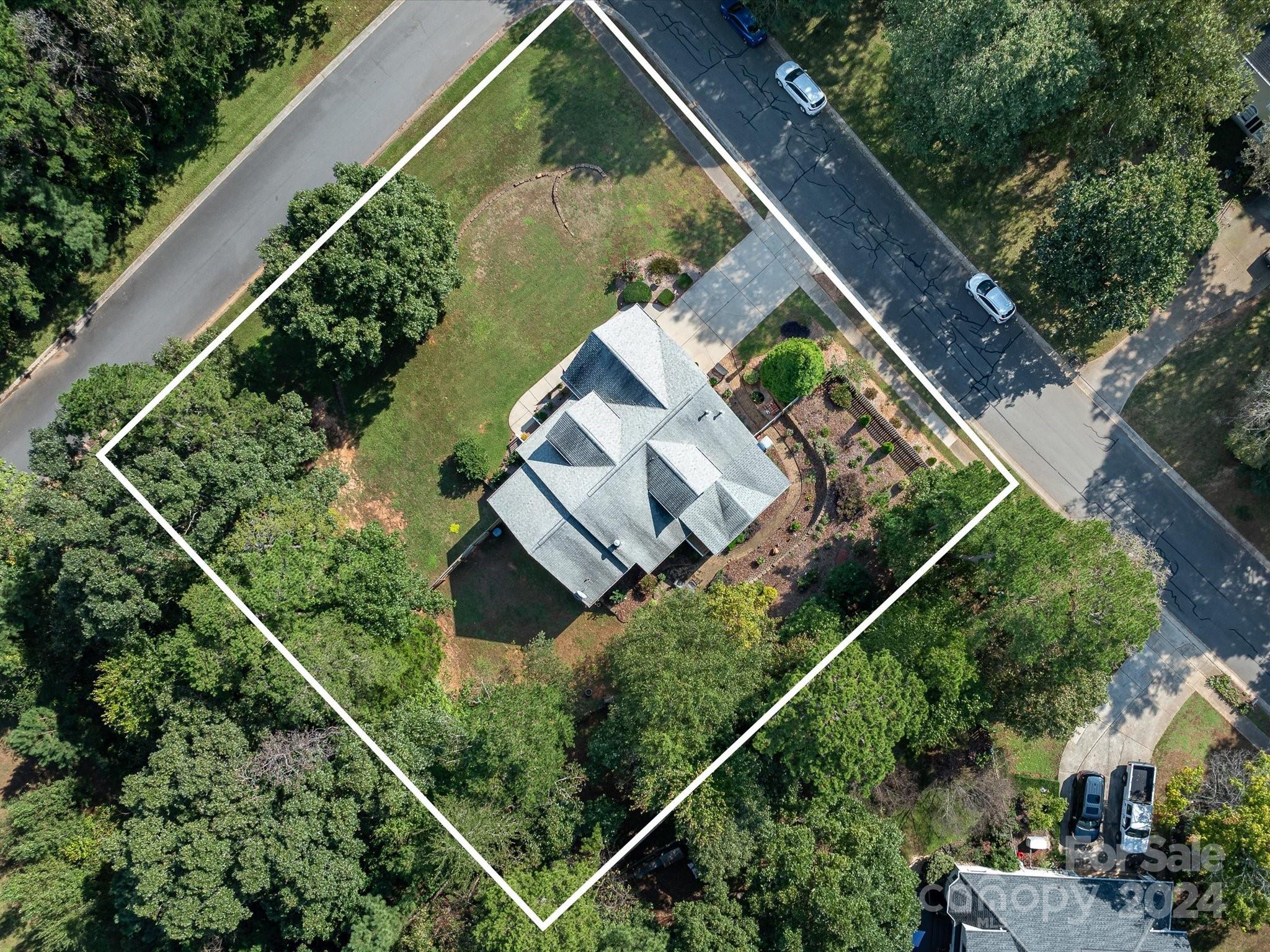 4100 Cherrybrook Drive Mint Hill, NC 28227 - Photo 42 of 45 an aerial view of house with a yard and potted plants